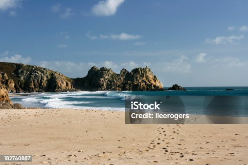 istock Porthcurno beach with atlantic waves and cliffs in West Cornwall 182760887