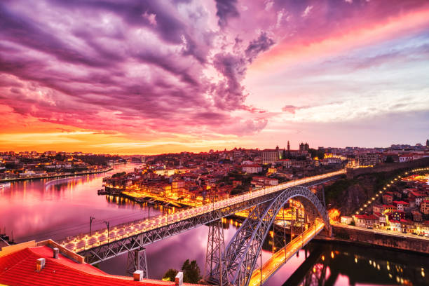 Porto Aerial Cityscape with Luis I Bridge and Douro River at Amazing Sunset stock photo