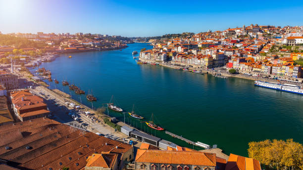 porto (oporto), old town on the douro river, panorama of porto with cable cars and boats. porto, portugal. - carro oporto imagens e fotografias de stock