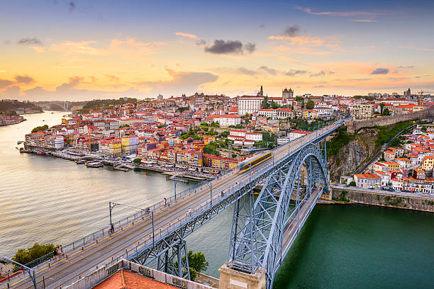 porto, portugal at dom luis bridge - portugal stok fotoğraflar ve resimler