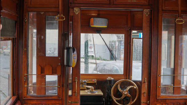 porto, portugal, circa 2018: interior of an old tram, passing through the streets of porto, portugal. - carro oporto imagens e fotografias de stock
