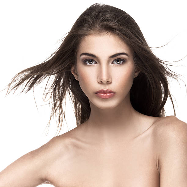 Portrait of a beautiful female model on white background stock photo