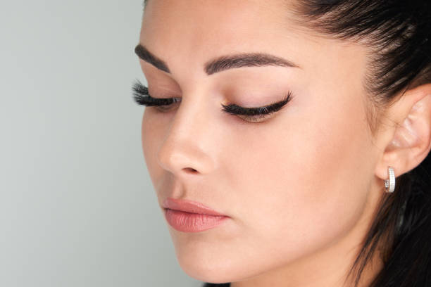 Portrait of a beautiful woman with long eyelashes stock photo