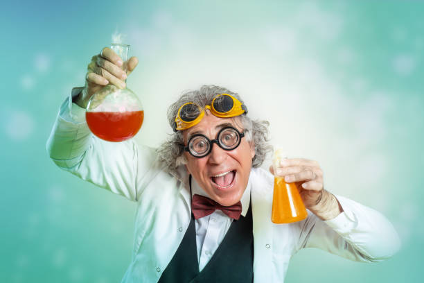 Portrait of a crazy scientist doing experiment stock photo