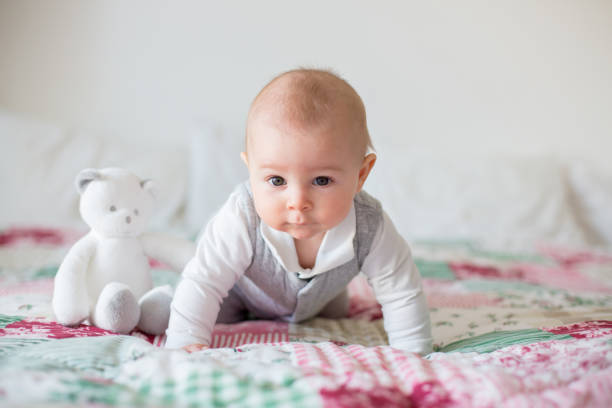 Portrait of a cute  infant baby boy. Happy childhood concept. stock photo