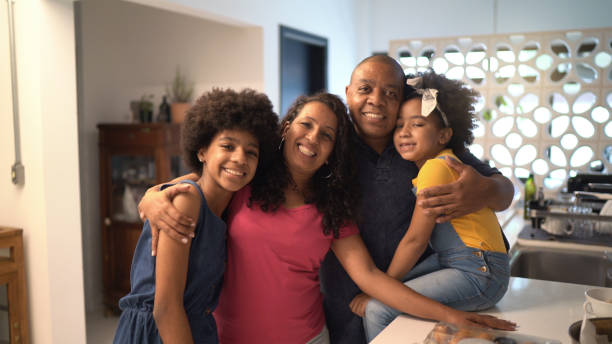 Portrait of a happy family together at home Portrait of a happy family together at home brazilian ethnicity stock pictures, royalty-free photos & images