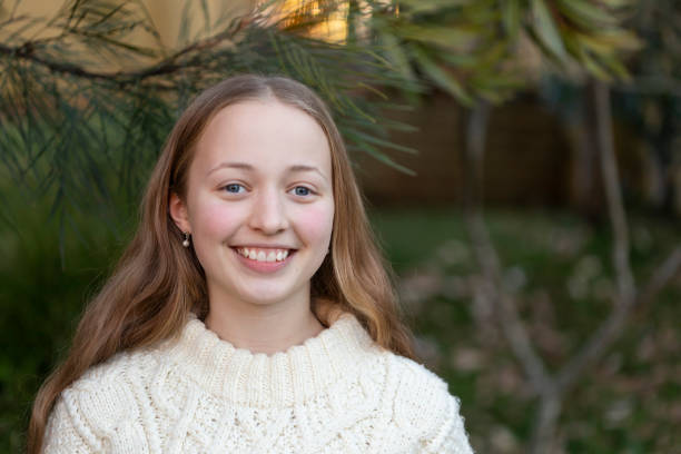 Portrait of a happy teenage girl stock photo