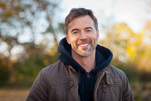 Portrait of A Mature Man Smiling at the camera stock photo