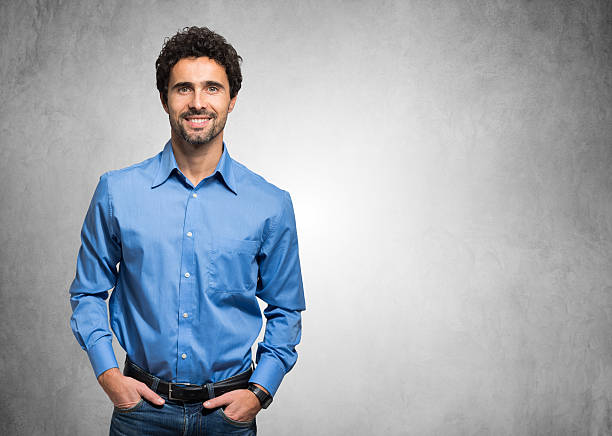 Portrait of a smiling man Portrait of a smiling man button down shirt stock pictures, royalty-free photos & images