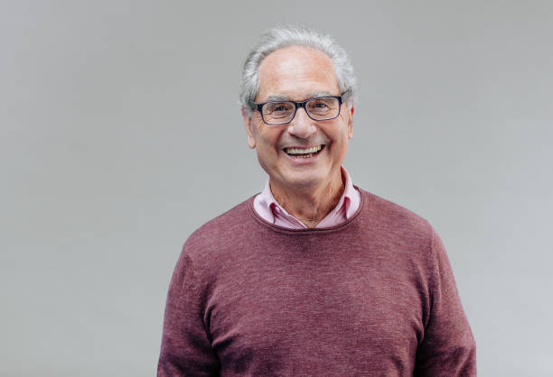 Portrait of a Smiling Senior Business Man stock photo