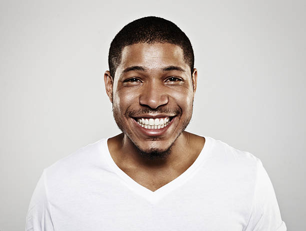 Portrait of a smiling young man stock photo