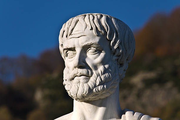 Portrait of a stones statue of Aristotle on a sunny day stock photo