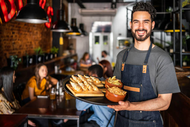 Portrait of a waiter in a cafe in Buenos Aires stock photo