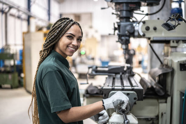 Portrait of a woman working in a factory/industry stock photo