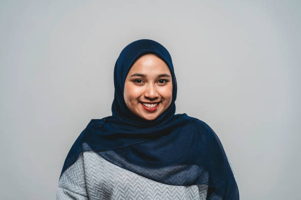 Portrait of a young adult malaysian woman Portrait of a young adult malaysian woman. Studio shot hijab stock pictures, royalty-free photos & images