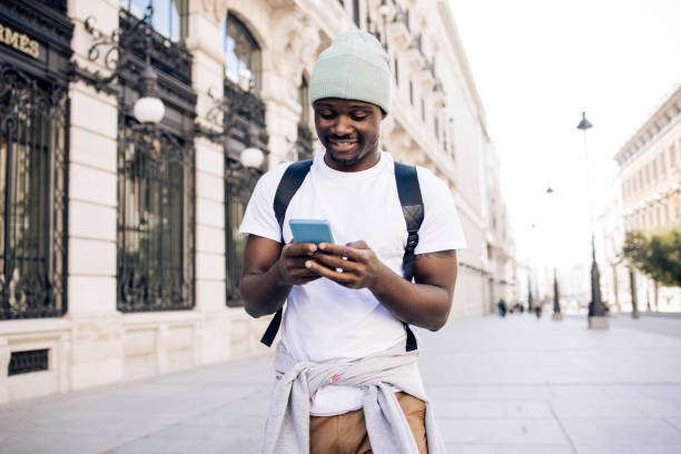 Portrait of a young African American man on vacation enjoying in Madrid stock photo
