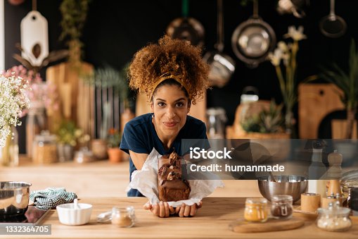 istock Portrait of a young African American woman baking a banana bread at home 1332364705