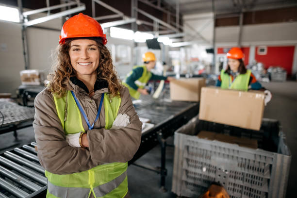 Portrait of a young woman in a warehouse stock photo