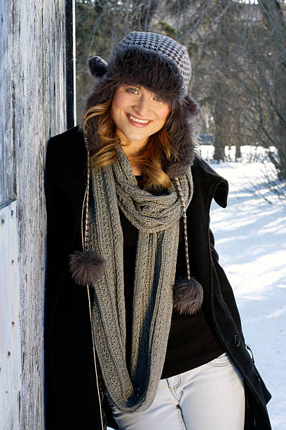 Portrait of a young woman in winter fashion stock photo