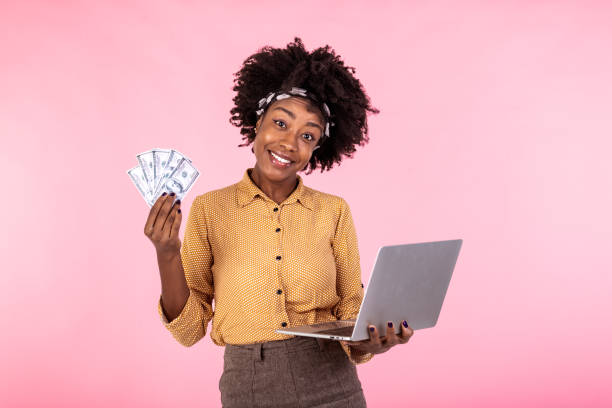 6,280 Black Woman Holding Money Stock Photos, Pictures & Royalty-Free  Images - iStock