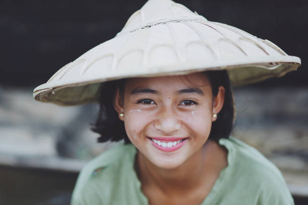 Portrait of Asian Beautiful Burmese girl farmer in Myanmar stock photo