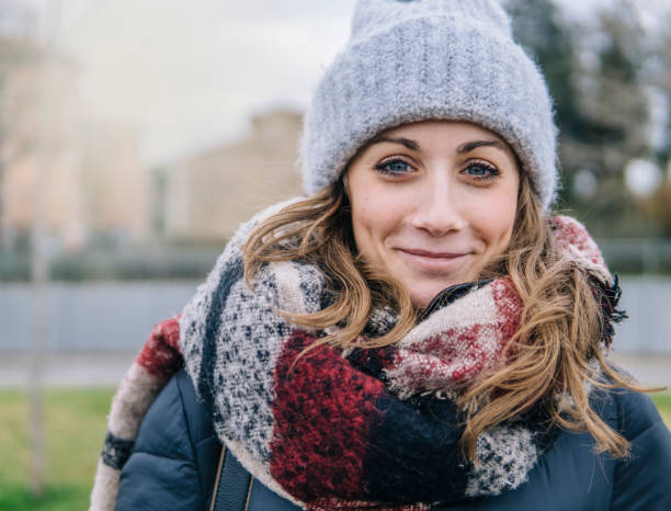 Portrait of beautiful young woman in winter stock photo