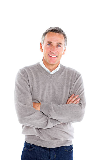 Portrait of cheerful mature man on white Portrait of cheerful mature man standing with his arms crossed on white background 55 59 years stock pictures, royalty-free photos & images