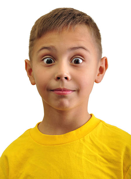 portrait of excited surprised small boy stock photo