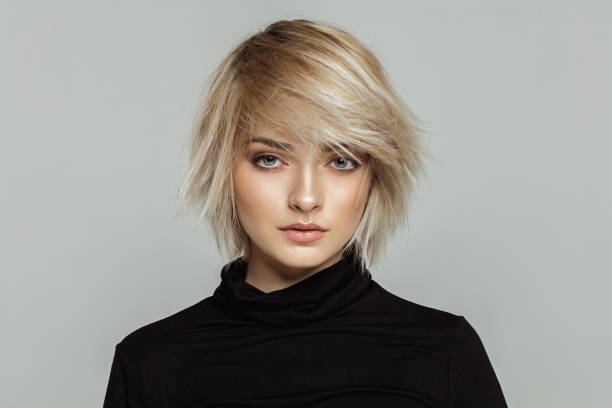 Portrait of fashion blond woman with short hair stock photo