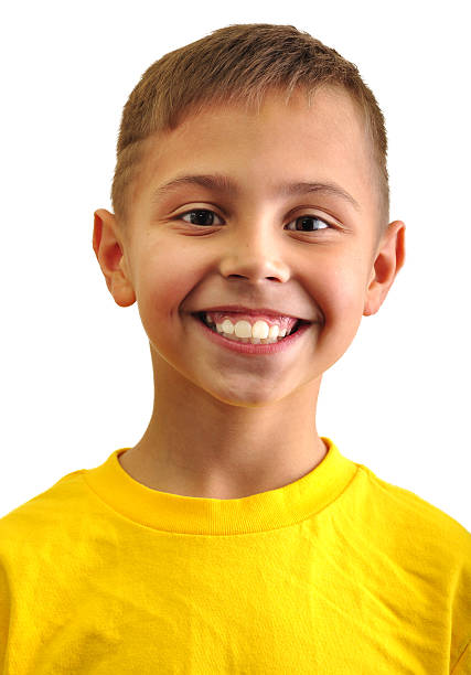 portrait of happily smiling boy stock photo