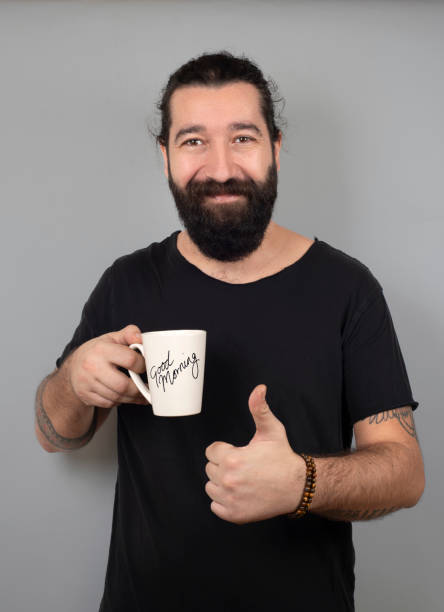 Portrait Of Hipster Man With Coffee mug stock photo