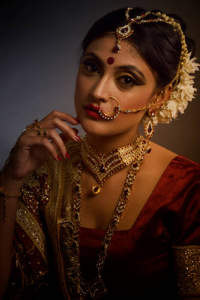 Portrait of Indian bride portrait of Indian Bride wearing jewelry indian bride stock pictures, royalty-free photos & images