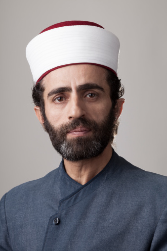 Photo libre de droit de Portrait De Musulmans Imam Avec Un Photo libre de droit de Portrait De Musulmans Imam Avec Un
