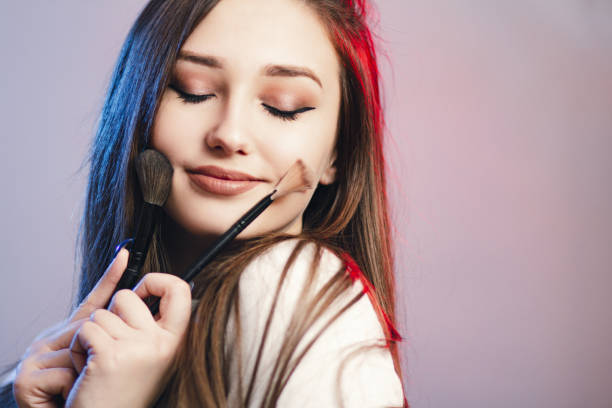 32 Girl Putting Makeup On Stock Photos, Pictures & Royalty-Free Images - iStock 32 Girl Putting Makeup On Stock Photos, Pictures & Royalty-Free Images - iStock
