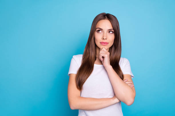 portrait of nice-looking attractive lovely lovable feminine gorgeous fascinating straight-haired girlfriend thinking creating plan isolated over bright vivid shine blue green teal turquoise background - incerteza imagens e fotografias de stock