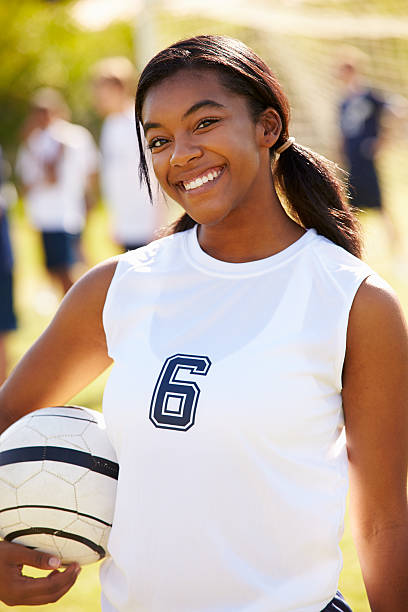 portrait of player in female high school soccer team - teen girls team sport bildbanksfoton och bilder