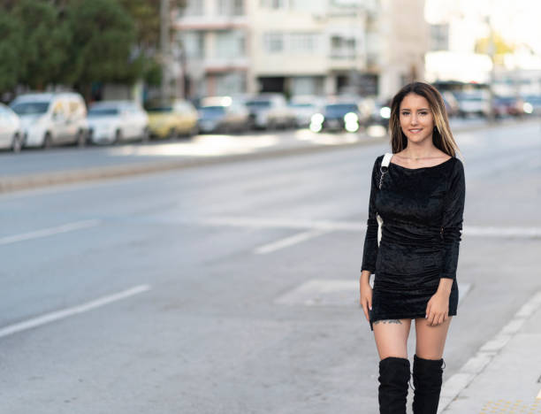 Portrait of pretty girl walking in the city Portrait of pretty girl walking in the city girls in very short dresses stock pictures, royalty-free photos & images