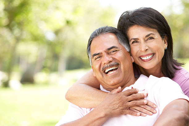 Portrait Of Senior Couple In Park  latin american and hispanic ethnicity stock pictures, royalty-free photos & images