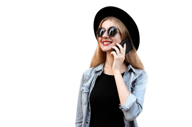 Portrait of smiling young woman calling on smartphone isolated on white background Portrait of smiling young woman calling on smartphone isolated on white background generation z photos stock pictures, royalty-free photos & images