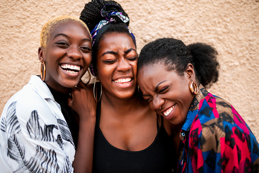 Three beautiful women laughing