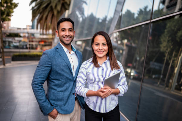 Portrait of two young business persons stock photo