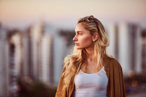 Portrait of woman at the roof party. Portrait of beautiful Caucasian woman at the roof party. loneliness photos stock pictures, royalty-free photos & images