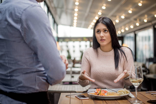 Portrait of woman complaining about food quality in restaurant. Portrait of woman complaining about food quality and taste in restaurant. complaining stock pictures, royalty-free photos & images