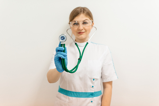 Nurse Standing And Holding Her Stethoscope Stock Image 