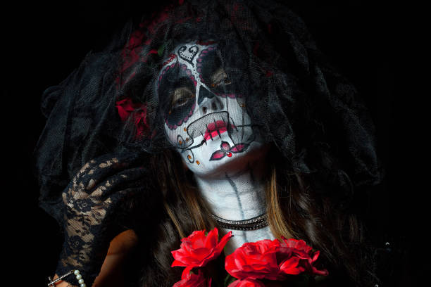 Portrait of woman dressed as catrina stock photo