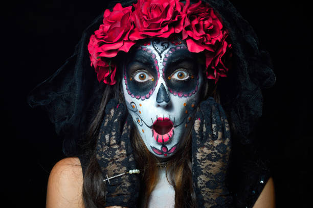 Portrait of woman dressed as catrina stock photo