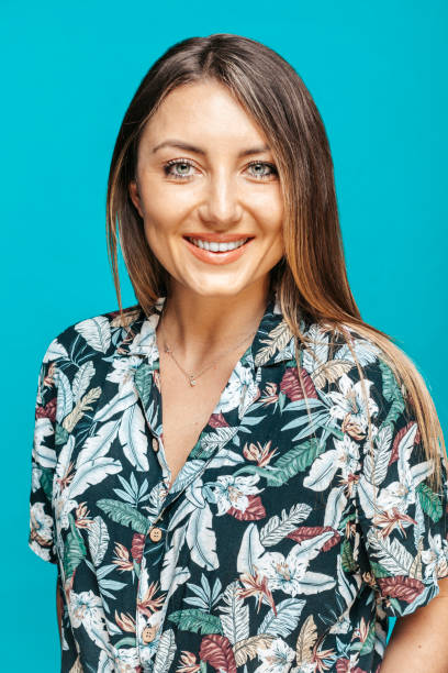 Portrait of woman wearing floral short sleeve shirt stock photo