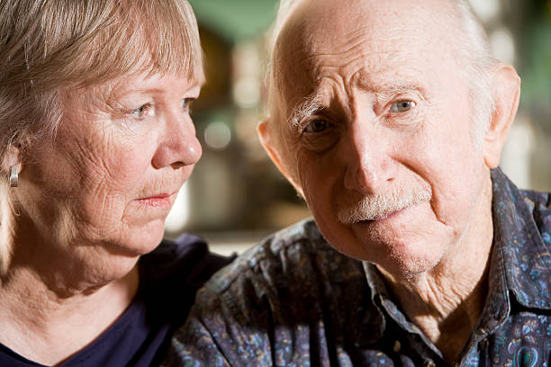 Portrait of Worried Senior Couple stock photo