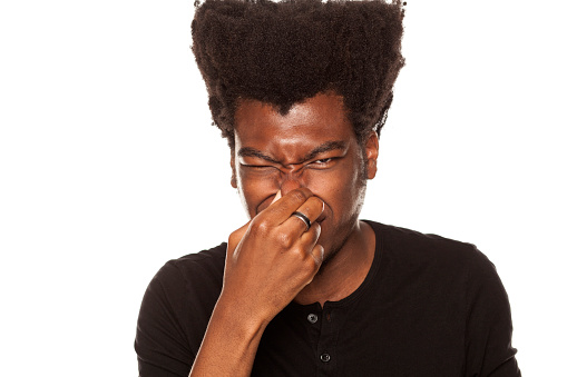 Image result for black man closing his nose