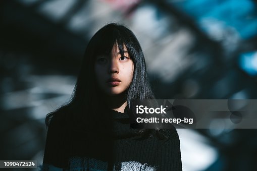 istock Portrait of young Asian woman 1090472524